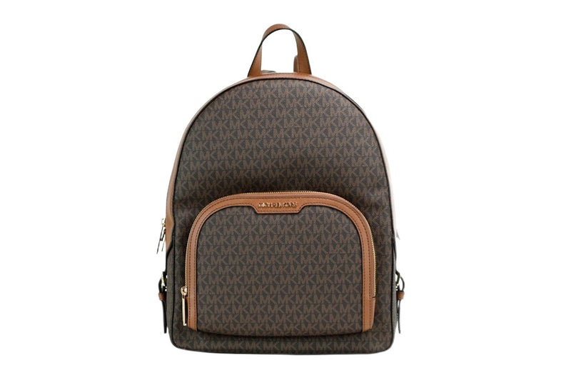 Brown PVC monogram backpack with tan leather trim and front zip pocket