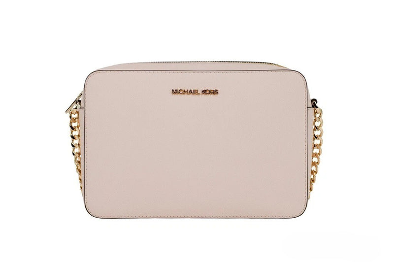 Powder blush leather Michael Kors crossbody bag with gold chain strap