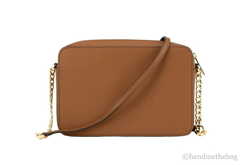 Brown leather crossbody bag with a rectangular shape, gold chain strap, and zipper closure