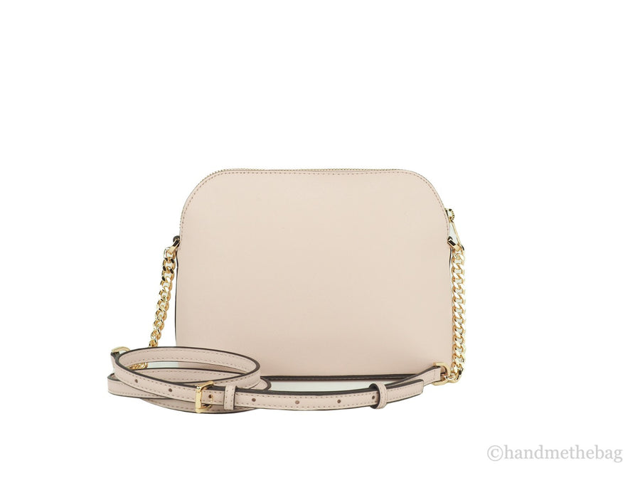 Beige leather dome crossbody bag with gold hardware and chain strap