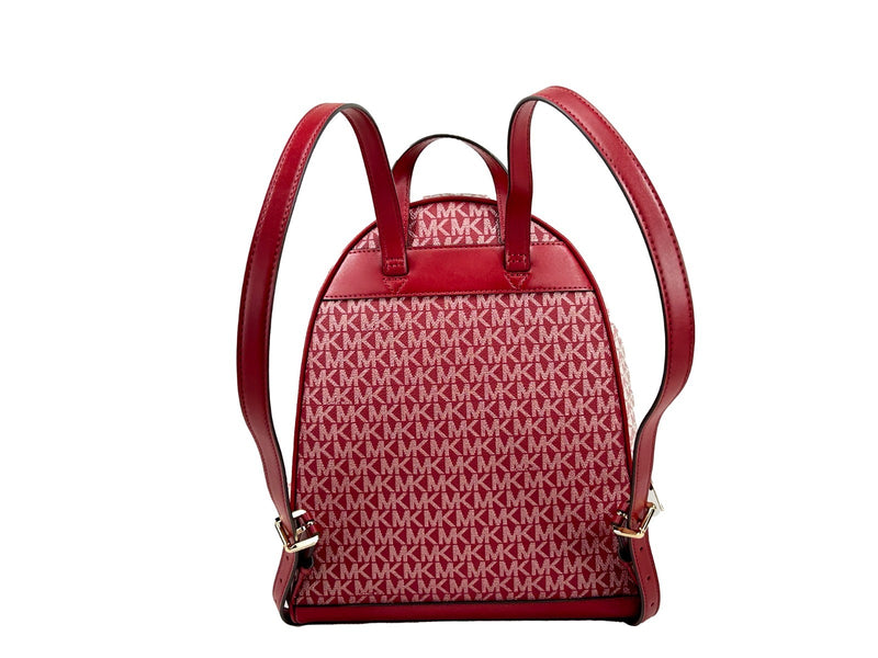 Red PVC Michael Kors monogram print backpack with straps