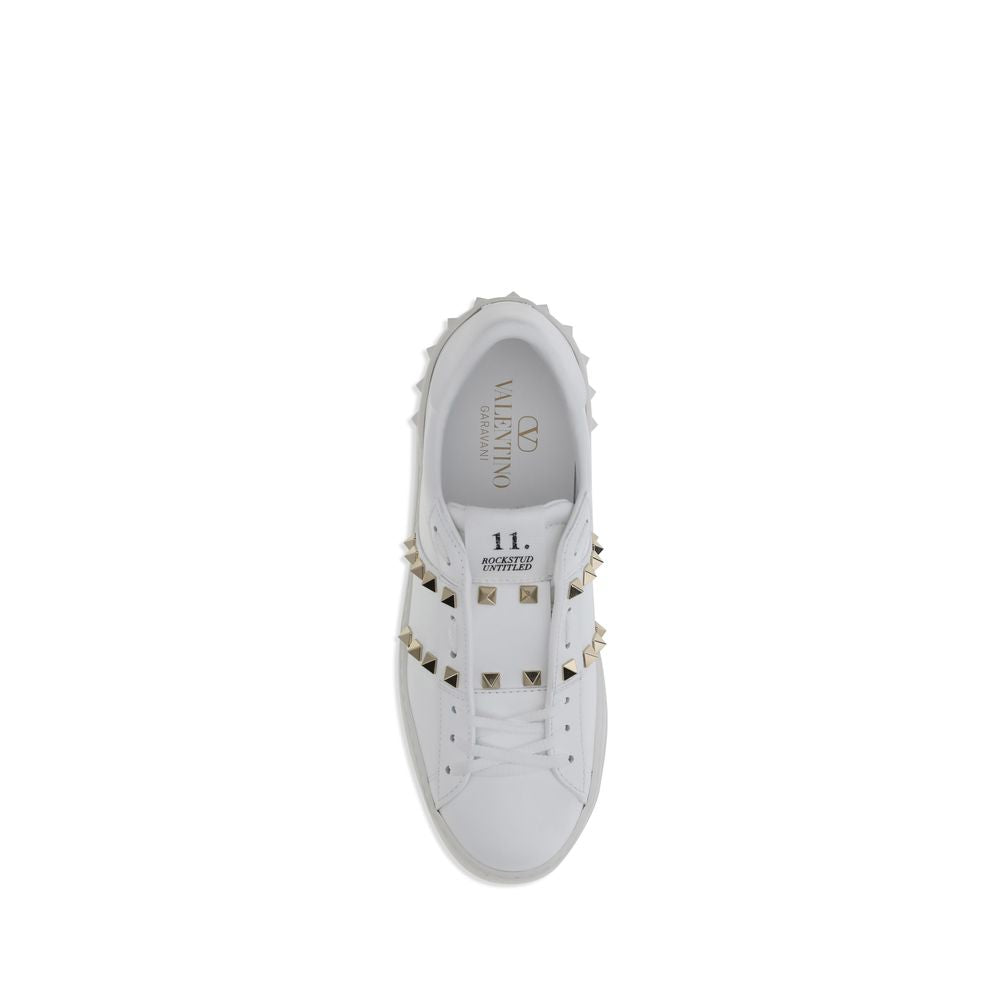 White calf leather Valentino Garavani sneaker with gold-tone pyramid studs and 