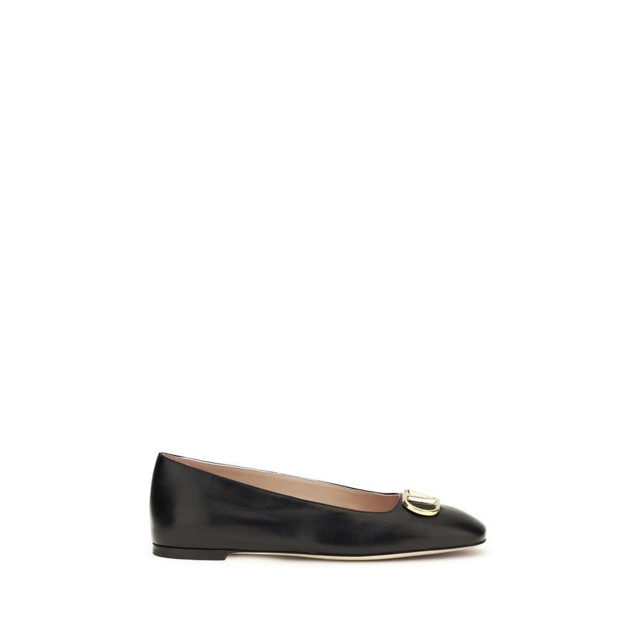 Black calf leather ballet flat with a rounded toe and a gold-tone metal VLogo hardware detail on the top.