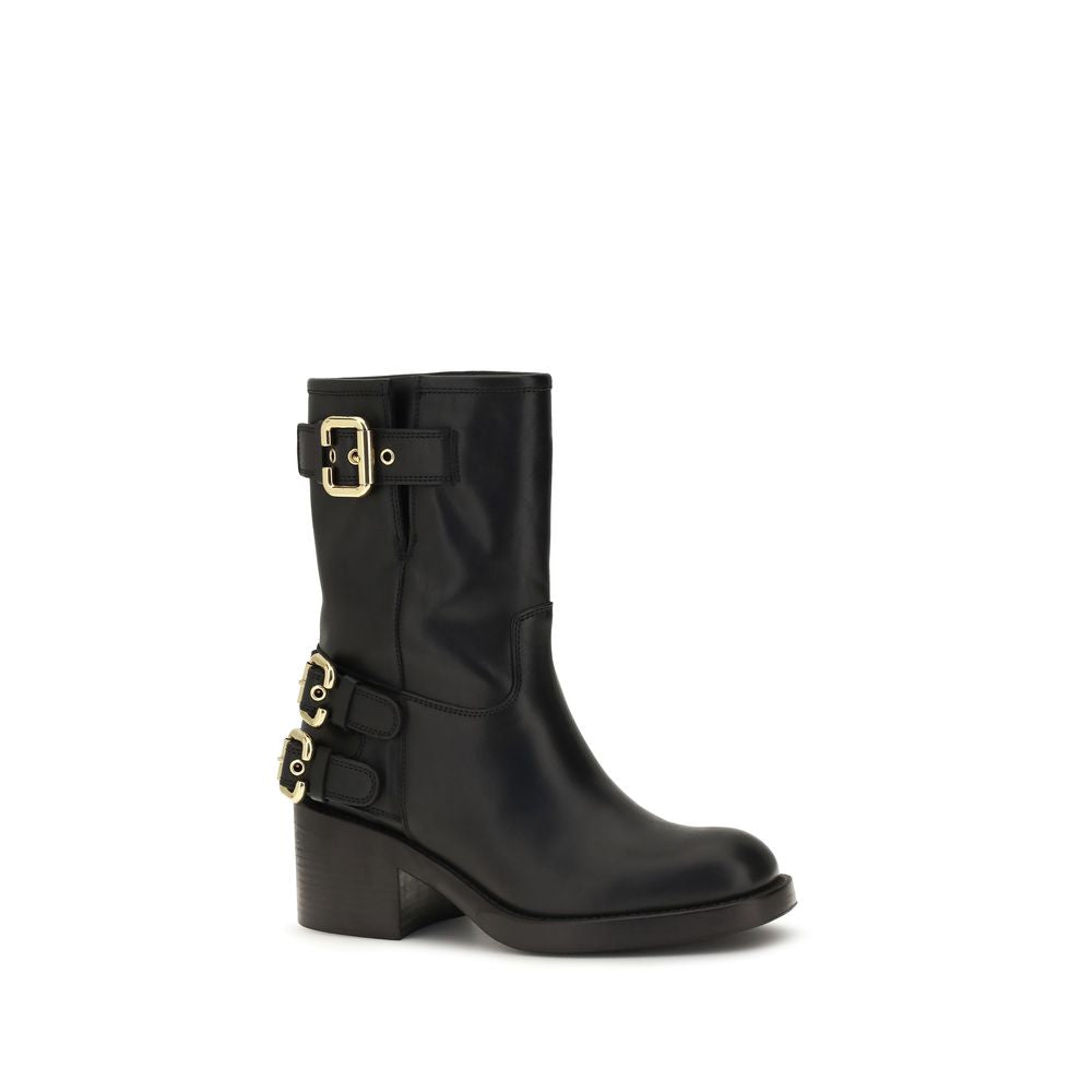 Black calf leather ankle boot with gold-tone buckle straps, rounded toe, and a stacked block heel.