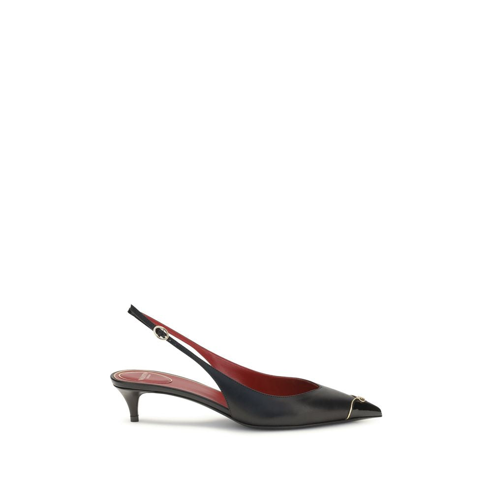 Black calf leather slingback pumps with a pointed toe, gold-tone metal tip detail, and low kitten heel.
