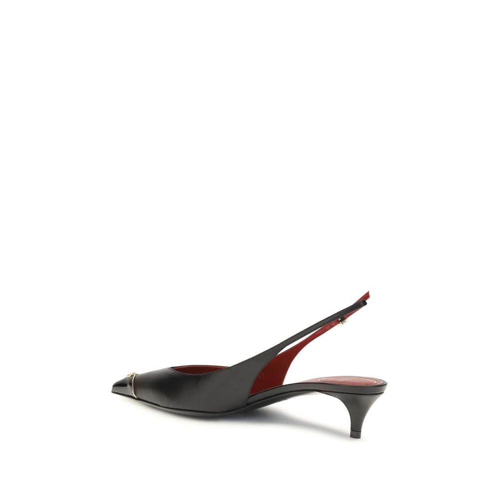 Black calf leather Valentino Garavani slingback pumps with a pointed toe, gold-tone accent, and kitten heel.