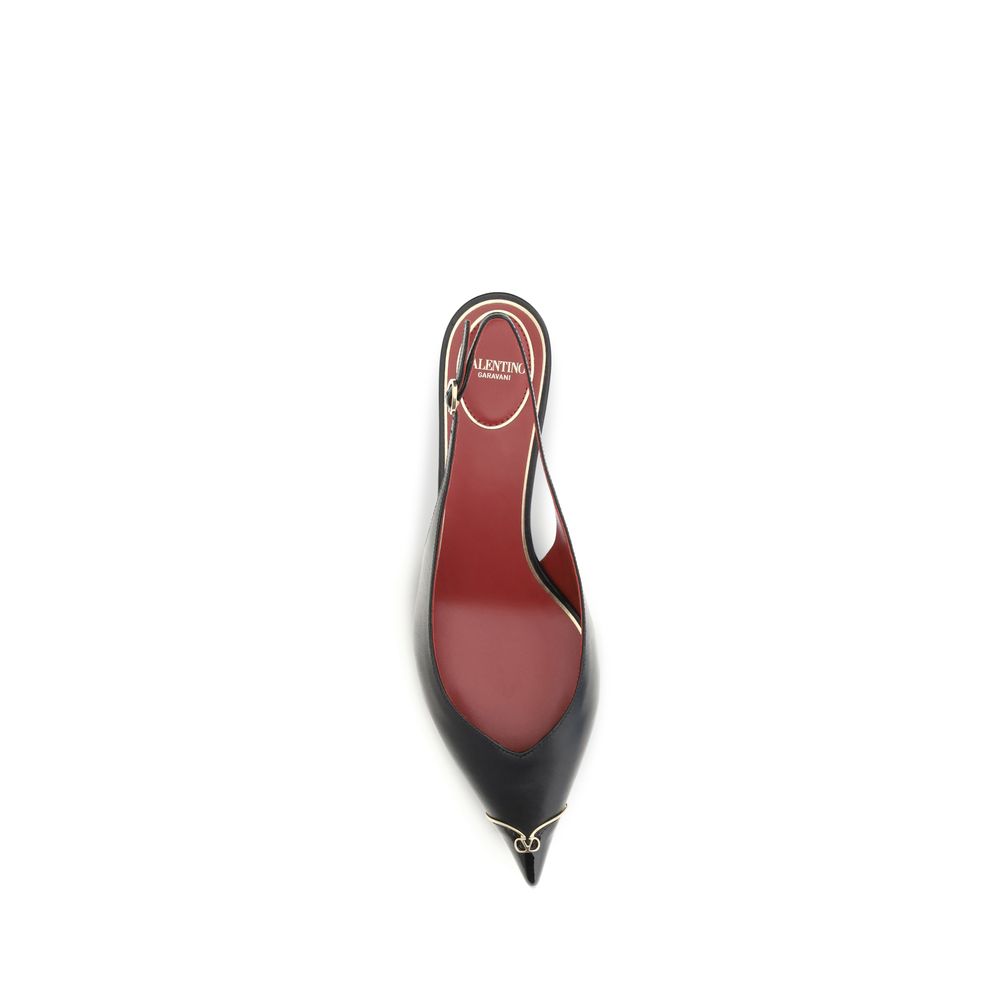 Valentino Garavani black calf leather pointed-toe slingback pump with a red interior and gold VLogo hardware.