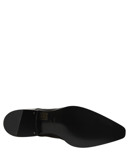 Female model wearing sleek black polished leather Derby shoes with a square toe, clean lace-up front, structured block heel, and high-gloss finish, captured mid-step in a casual lifestyle pose showcasing the shoe's sharp profile and sophisticated silhouette.