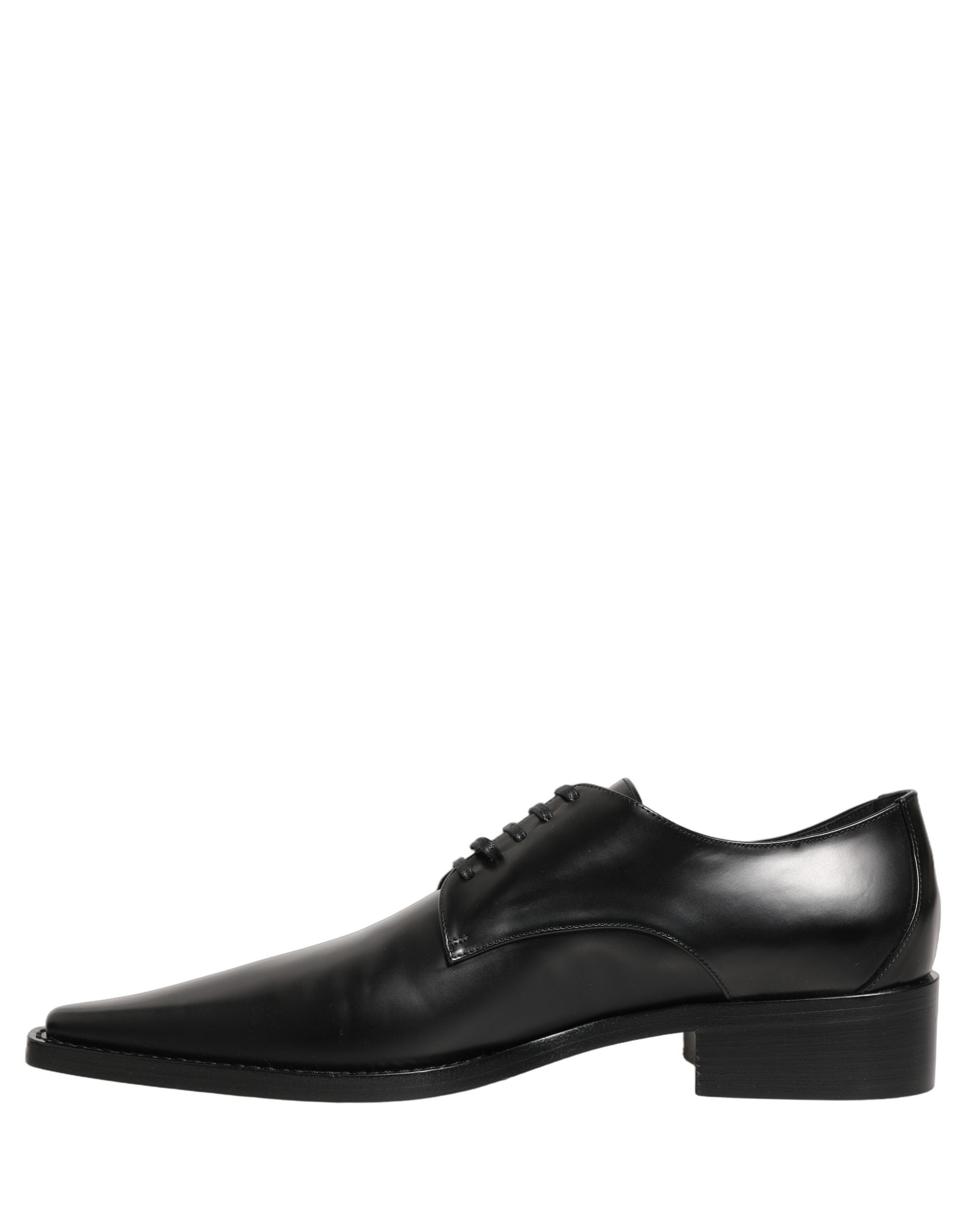 Female model wearing sleek black polished leather Derby shoes with a square toe, clean lace-up front, structured block heel, and high-gloss finish, captured mid-step in a casual lifestyle pose showcasing the shoe's sharp profile and sophisticated silhouette.