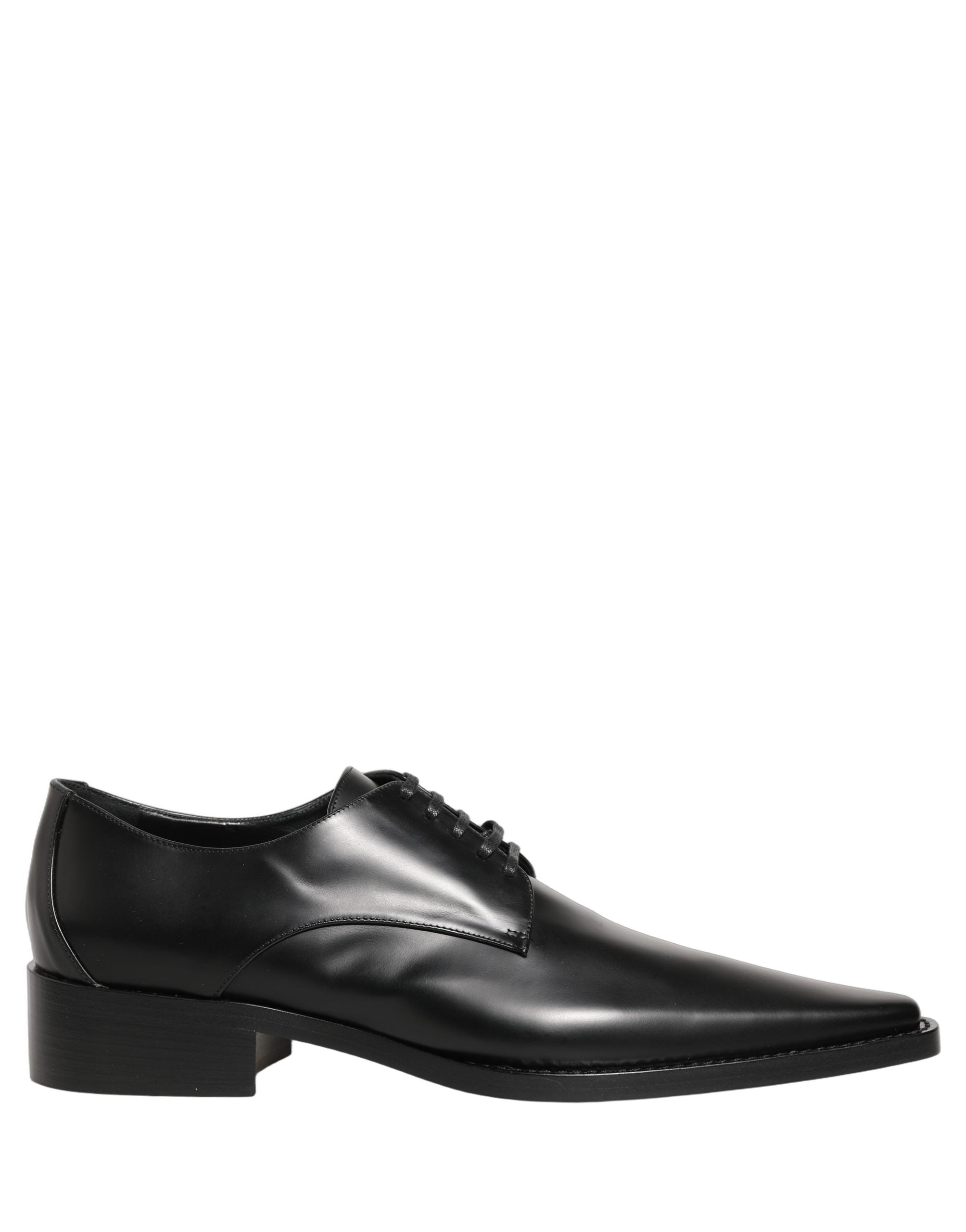 Female model wearing sleek black polished leather Derby shoes with a square toe, clean lace-up front, structured block heel, and high-gloss finish, captured mid-step in a casual lifestyle pose showcasing the shoe's sharp profile and sophisticated silhouette.