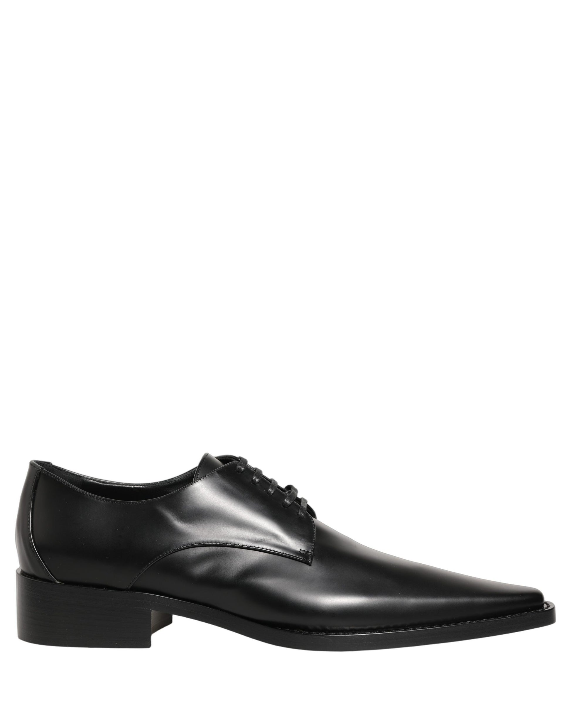 Female model wearing sleek black polished leather Derby shoes with a square toe, clean lace-up front, structured block heel, and high-gloss finish, captured mid-step in a casual lifestyle pose showcasing the shoe's sharp profile and sophisticated silhouette.