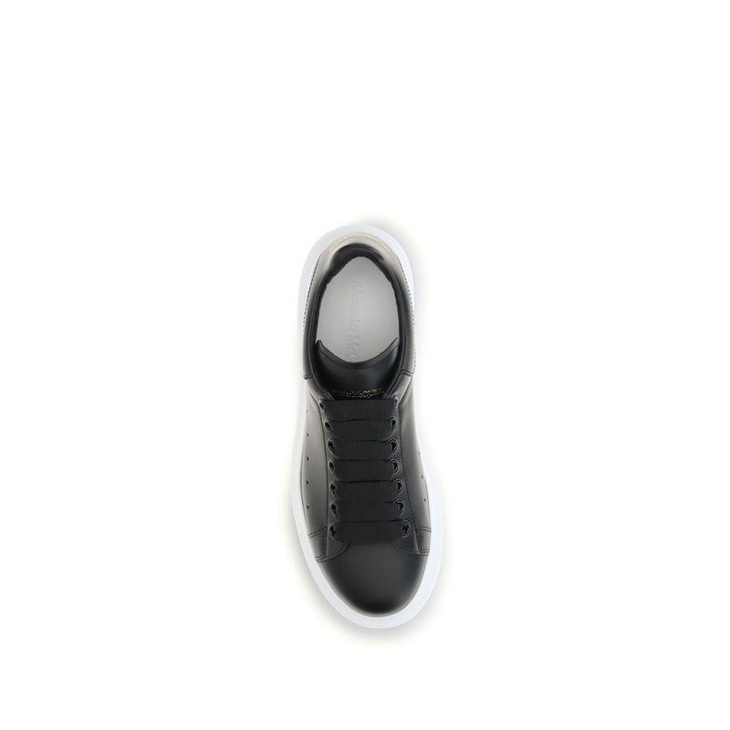 Black leather platform sneaker seen from above with thick white sole and black laces