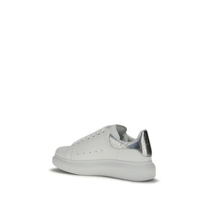Alexander McQueen white calf leather platform sneaker with silver heel counter.