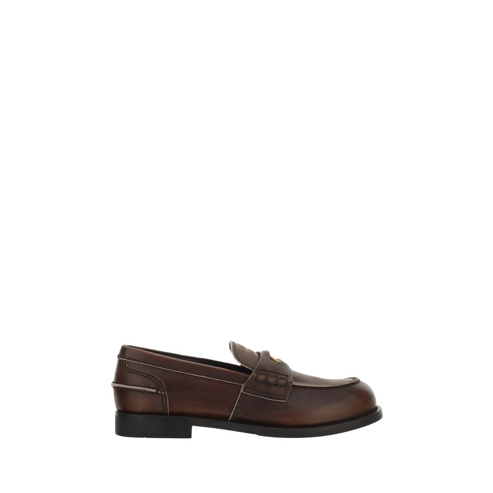 Brown loafer shoe on a white background