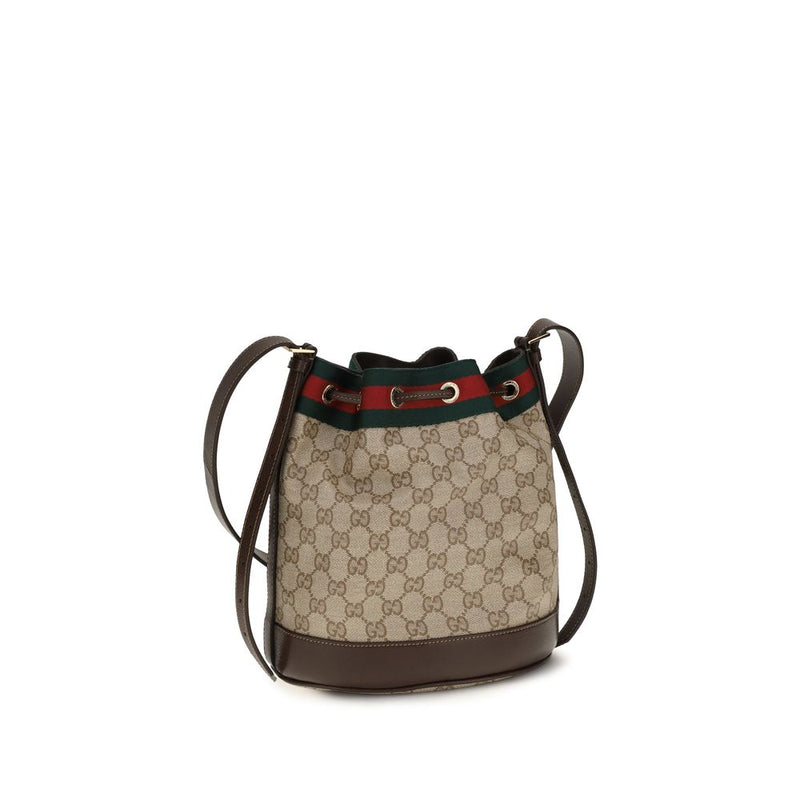 Beige canvas bucket handbag featuring brown leather trim and a red and green web stripe