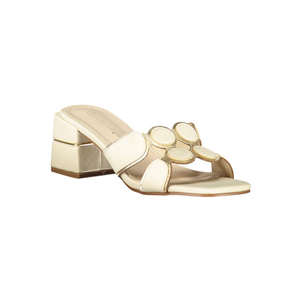 Female model wearing Laura Biagiotti beige polyurethane women's sandal with a warm beige upper, elegant strap detailing, and refined Italian craftsmanship, captured mid-step in a casual lifestyle pose showcasing the sandal's relaxed neutral charm and effortless summer sophistication