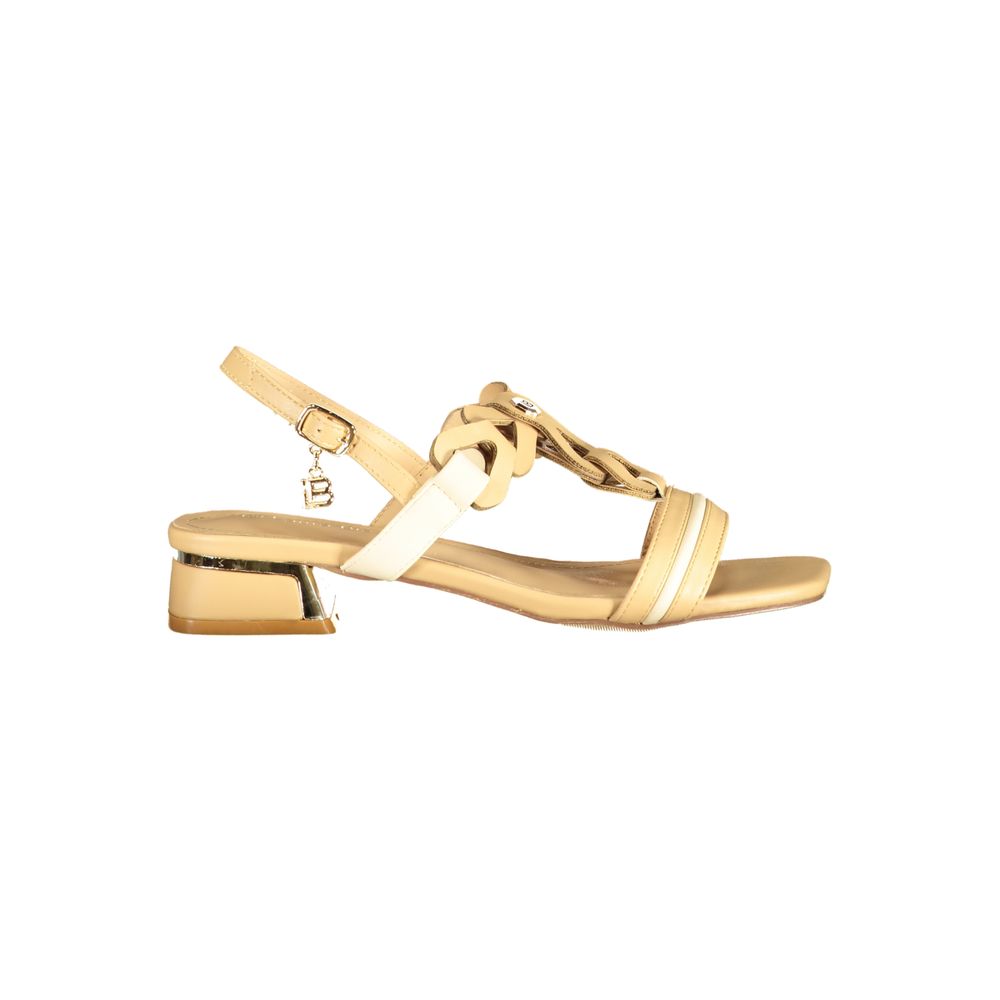 Female model wearing Laura Biagiotti beige polyurethane women's sandal with a warm beige upper, elegant strap detailing, and refined Italian craftsmanship, captured mid-step in a casual lifestyle pose showcasing the sandal's timeless neutral sophistication and effortless summer style.