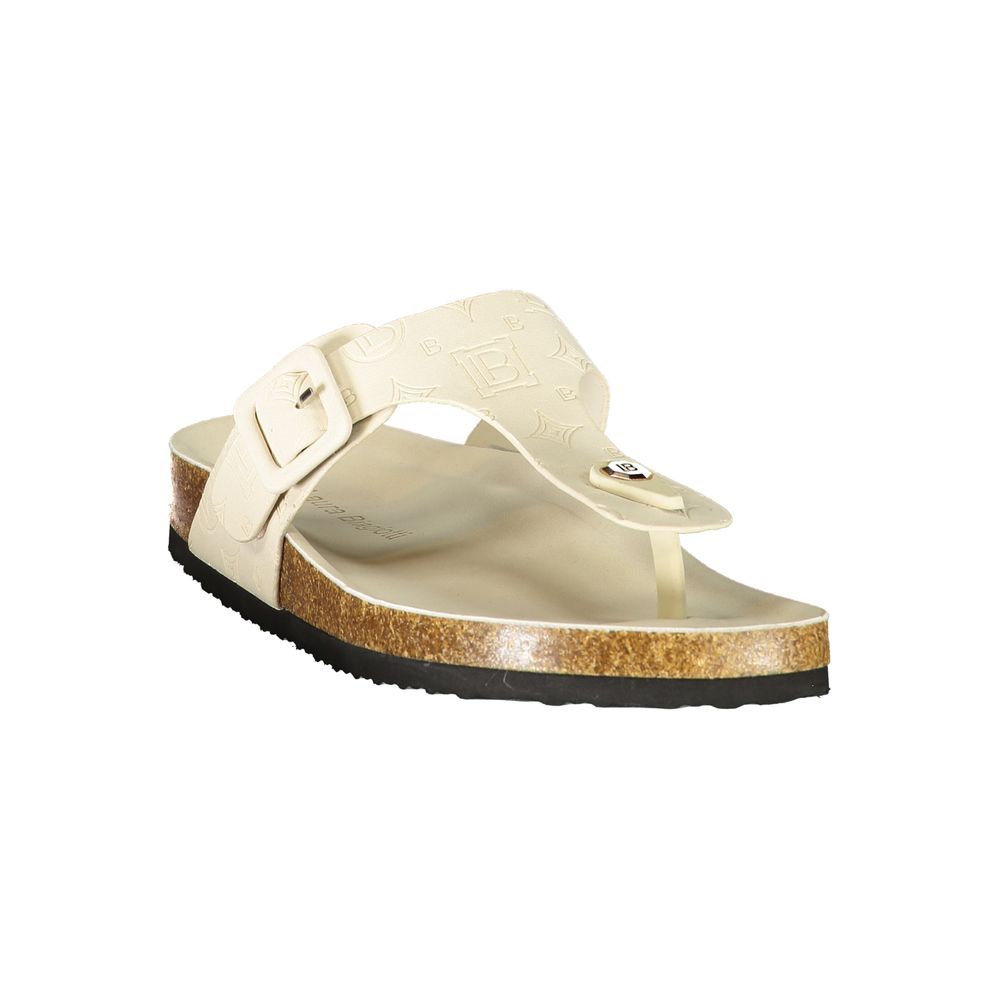 Female model wearing Laura Biagiotti bianco white polyurethane women's slide ciabatta with a clean white upper, effortless slip-on silhouette, and refined Italian craftsmanship, captured mid-step in a casual lifestyle pose showcasing the slide's crisp summer freshness and understated designer elegance.