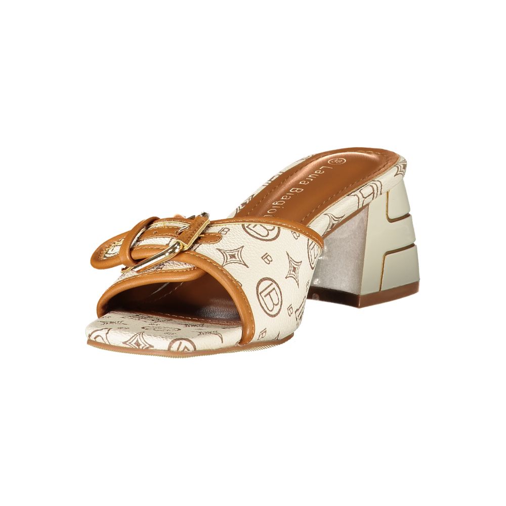 Female model wearing Laura Biagiotti beige polyurethane women's sandal with a warm beige upper, elegant strap detailing, and refined Italian craftsmanship, captured mid-step in a casual lifestyle pose showcasing the sandal's classic neutral warmth and effortless summer luxury.