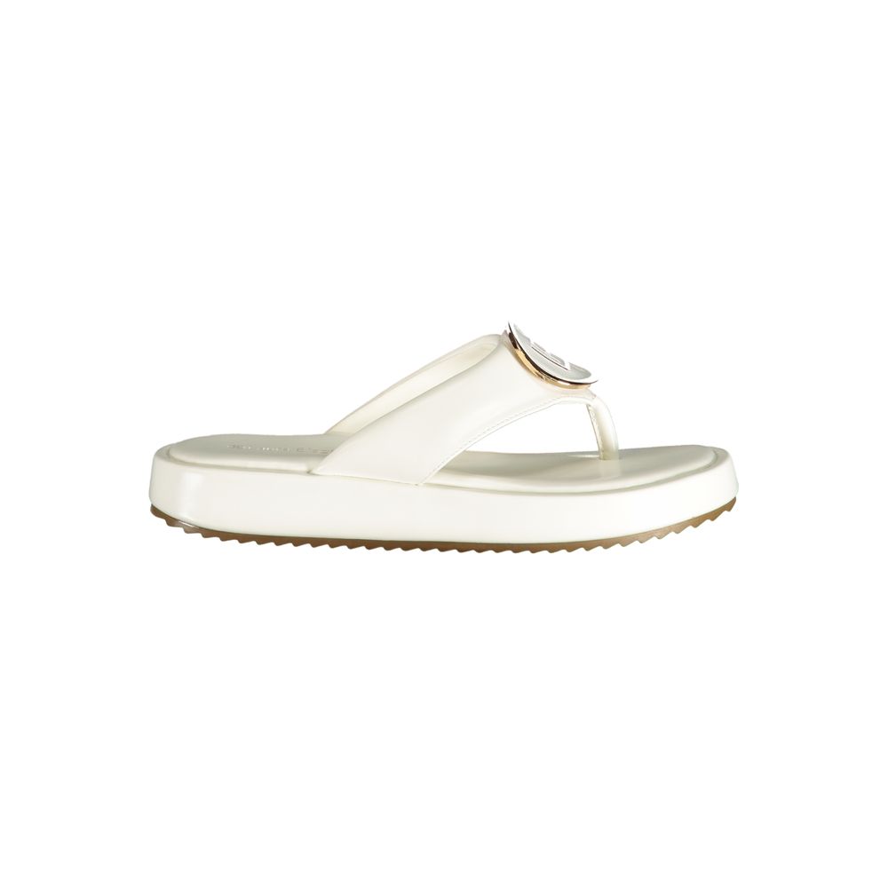 White polyurethane platform thong sandal by Laura Biagiotti with gold logo detail.