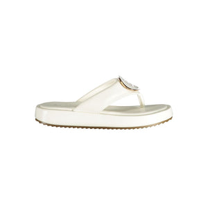 White polyurethane platform thong sandal by Laura Biagiotti with gold logo detail.