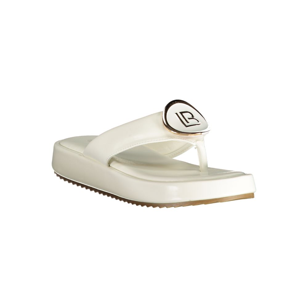 White polyurethane platform thong sandal by Laura Biagiotti with gold-tone brand logo embellishment.