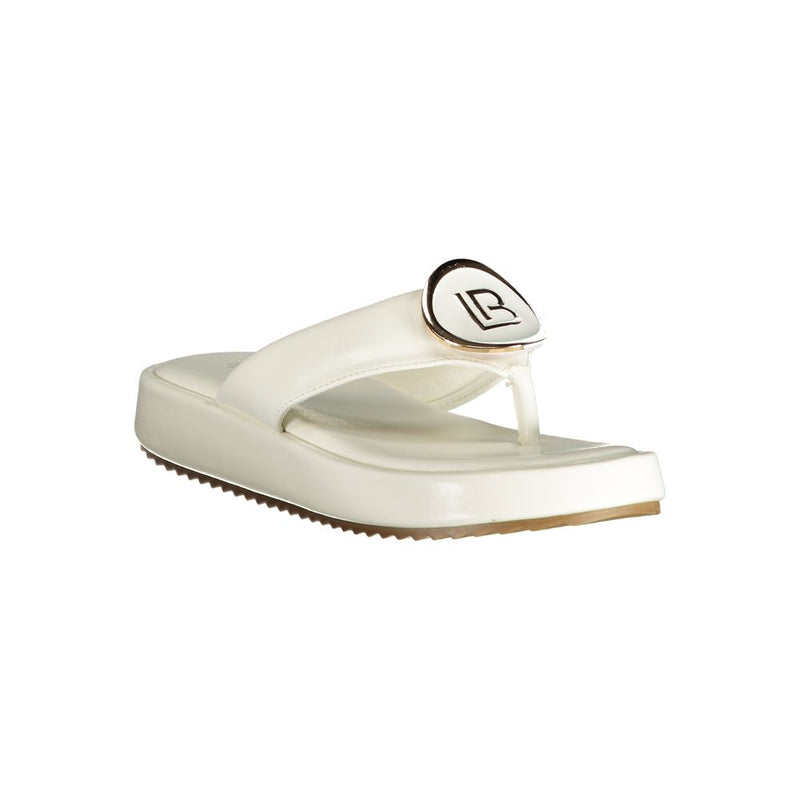 White polyurethane platform thong sandal by Laura Biagiotti with gold-tone brand logo embellishment.