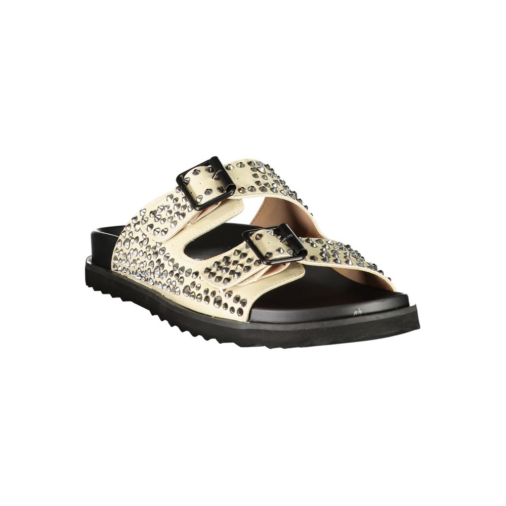 Female model wearing Laura Biagiotti beige polyurethane women's slipper with a warm beige upper, effortless slip-on silhouette, and refined Italian craftsmanship, captured mid-step in a casual lifestyle pose showcasing the slipper's understated luxury and relaxed everyday elegance.