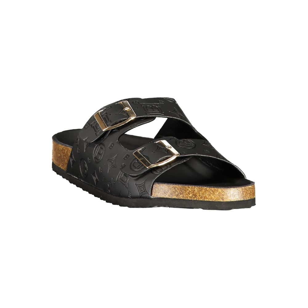 Female model wearing Laura Biagiotti nero black polyurethane women's sandal with a sleek black upper, elegant strap detailing, and refined Italian craftsmanship, captured mid-step in a casual lifestyle pose showcasing the sandal's timeless sophistication and effortless everyday luxury