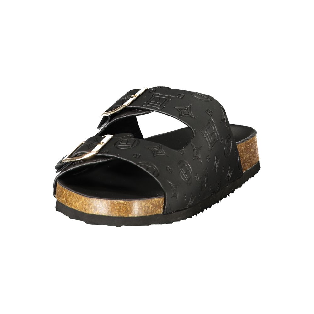 Female model wearing Laura Biagiotti nero black polyurethane women's sandal with a sleek black upper, elegant strap detailing, and refined Italian craftsmanship, captured mid-step in a casual lifestyle pose showcasing the sandal's timeless sophistication and effortless everyday luxury