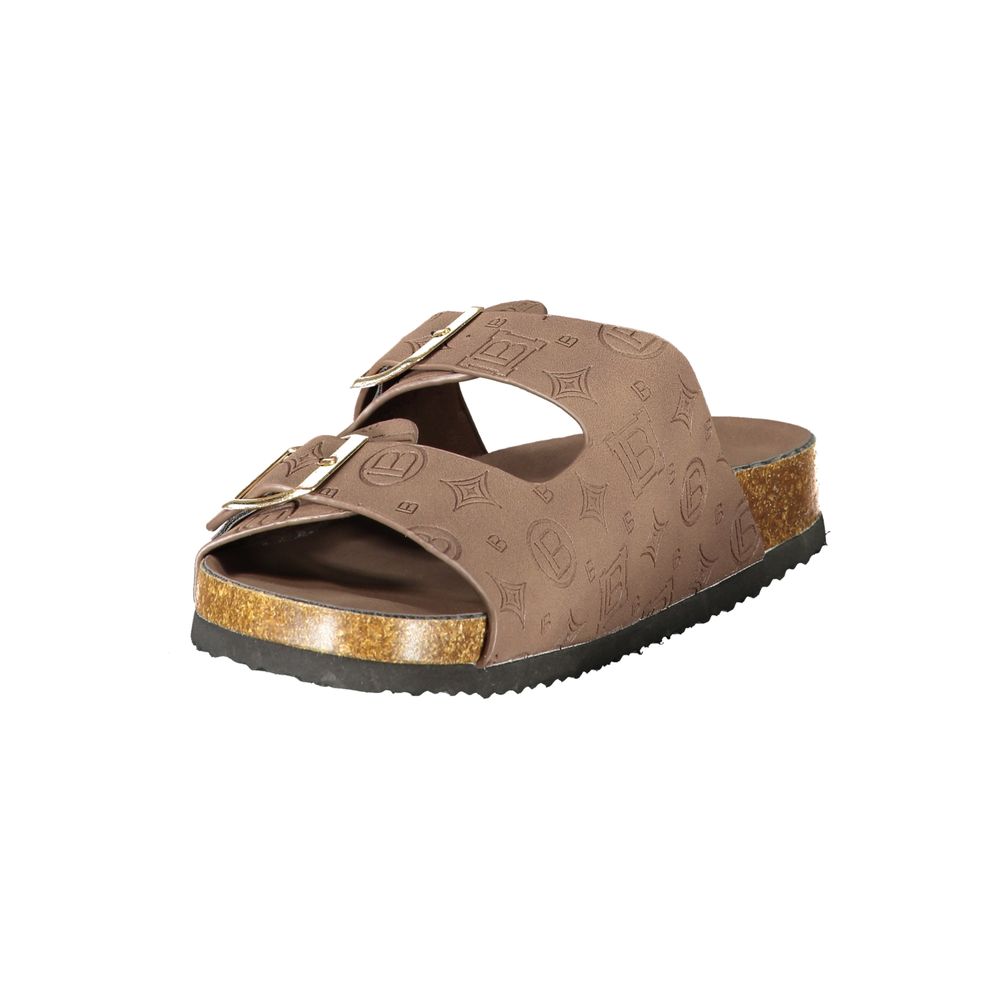 Brown sandal with cork sole on a white background