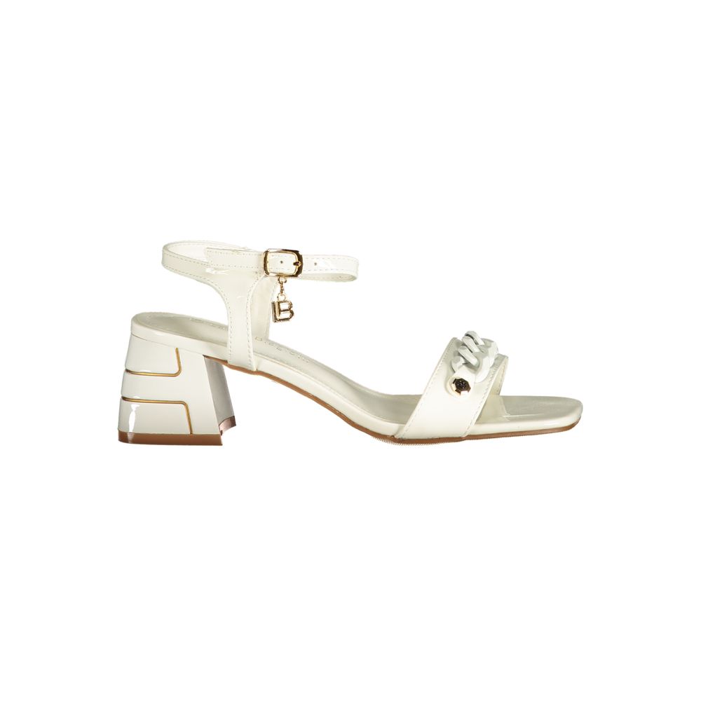 Female model wearing Laura Biagiotti white polyurethane women's sandal with a clean white upper, elegant strap detailing, and refined Italian craftsmanship, captured mid-step in a casual lifestyle pose showcasing the sandal's crisp summer freshness and effortless designer elegance.