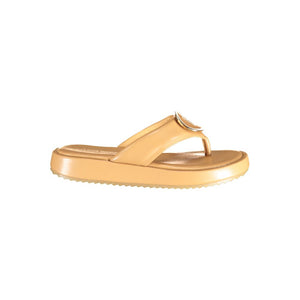 Beige polyurethane women's thong sandal with a gold-tone logo accent and a platform sole.