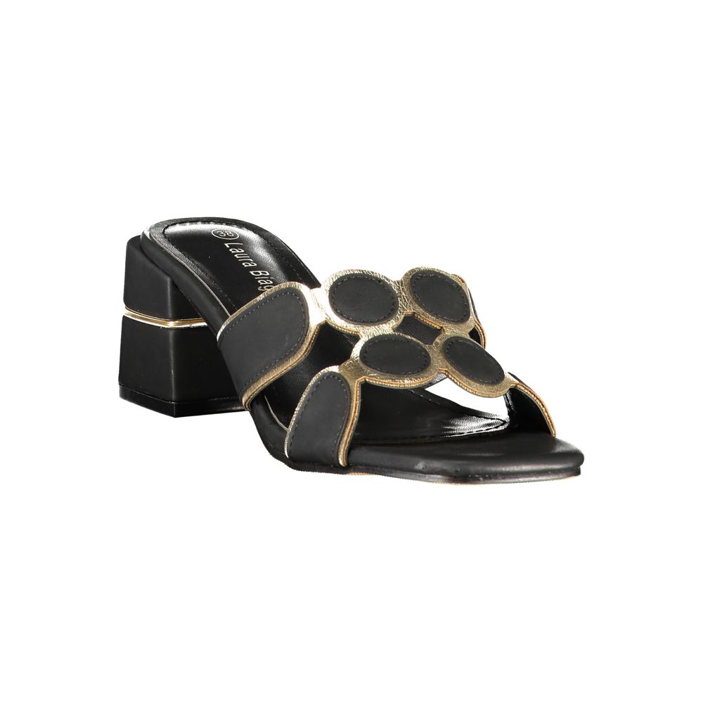 Female model wearing Laura Biagiotti black polyethylene platform sandals with a sleek black upper, bold elevated platform sole, and refined Italian detailing, captured mid-step in a casual lifestyle pose showcasing the sandal's edgy summer style and designer flair