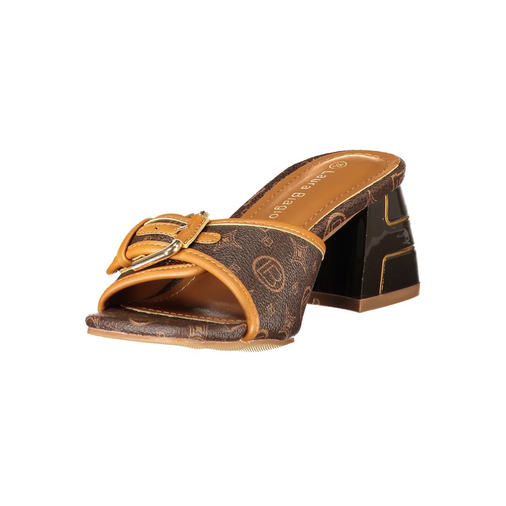 Female model wearing Laura Biagiotti brown polyurethane women's sandal with a warm brown upper, elegant strap detailing, and refined Italian craftsmanship, captured mid-step in a casual lifestyle pose showcasing the sandal's earthy sophistication and effortless summer luxury.