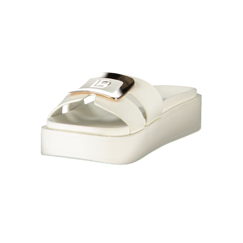 Female model wearing Laura Biagiotti white polyurethane women's sandal with a clean white upper, elegant strap detailing, and refined Italian craftsmanship, captured mid-step in a casual lifestyle pose showcasing the sandal's understated sophistication and effortless summer luxury.