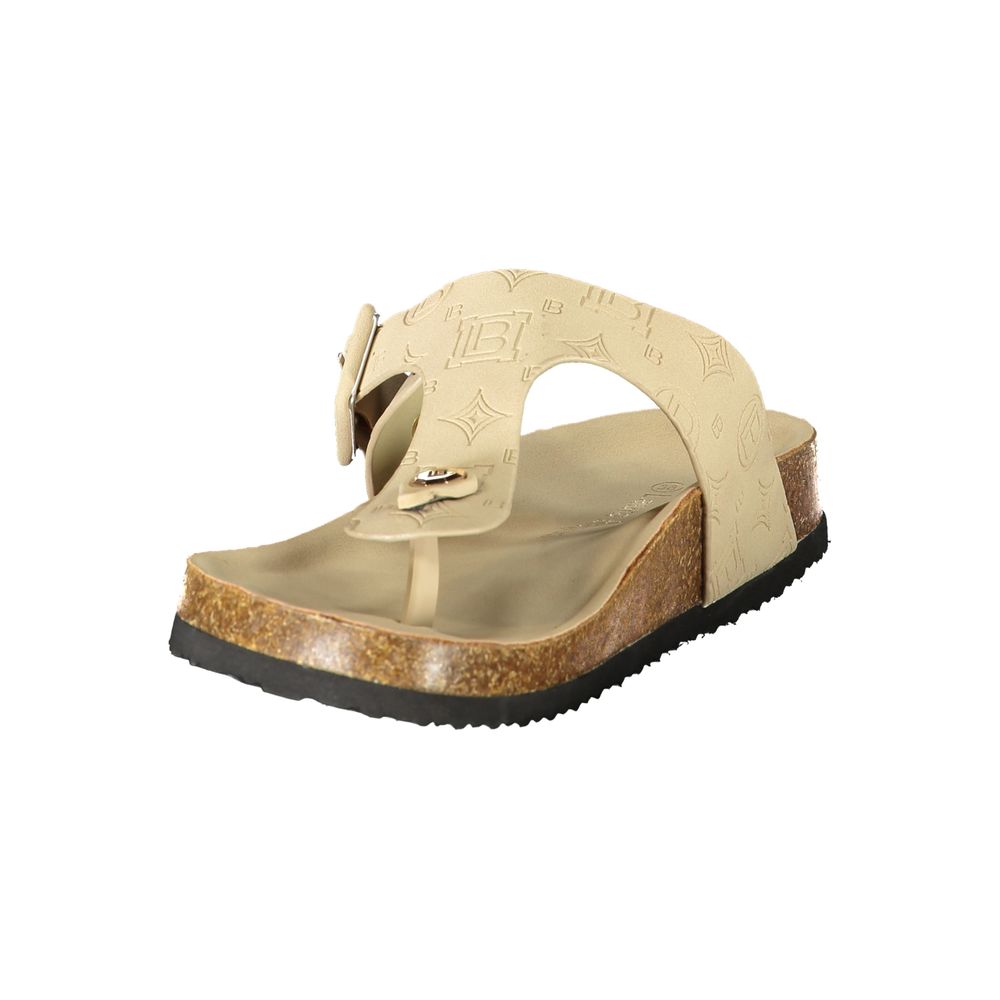 Beige polyurethane women's thong-style slipper with embossed logo pattern and cork-effect sole.