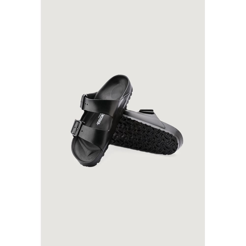 Pair of black Birkenstock EVA double-strap sandals on a light background.