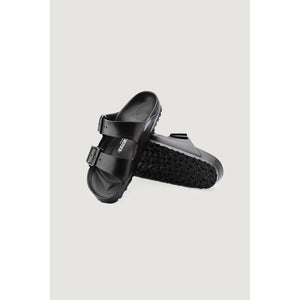 Pair of black Birkenstock EVA double-strap sandals on a light background.