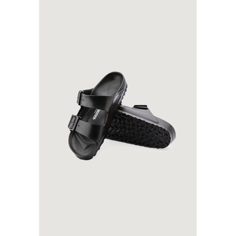Pair of black Birkenstock EVA double-strap sandals on a light background.