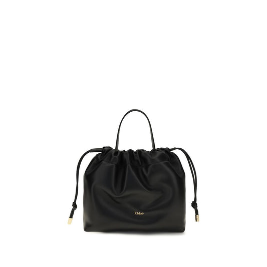 Chloé black lambskin shoulder bag with a gathered drawstring top, top handle, and gold-tone logo.