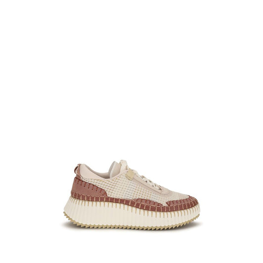 White sneaker with brown accents on a white background