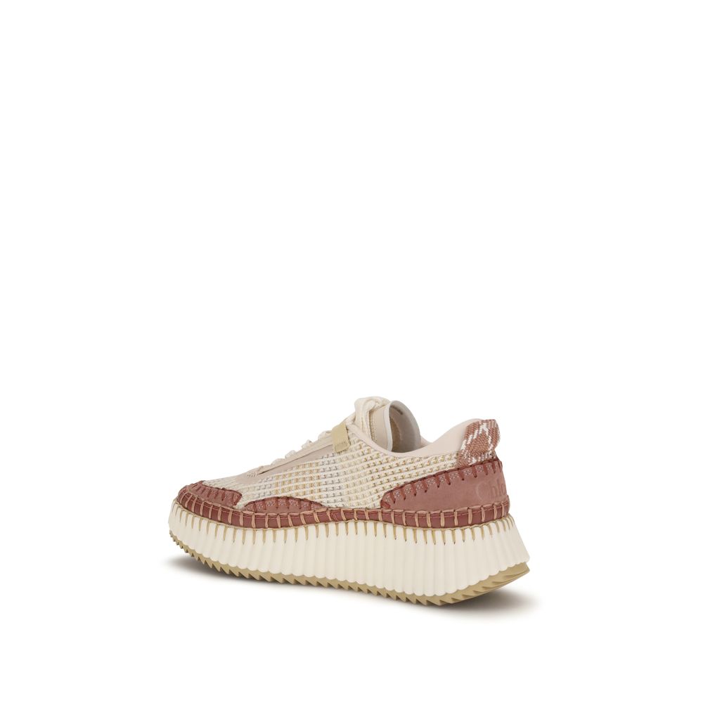 Beige and brown sneaker on a white background