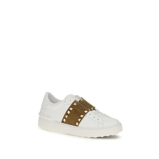 White leather Valentino Garavani low-top sneaker featuring an olive suede strap with signature gold-tone studs.