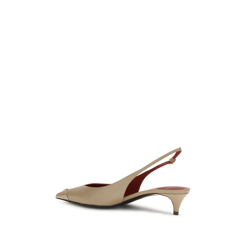 Beige high-heeled shoe on a white background