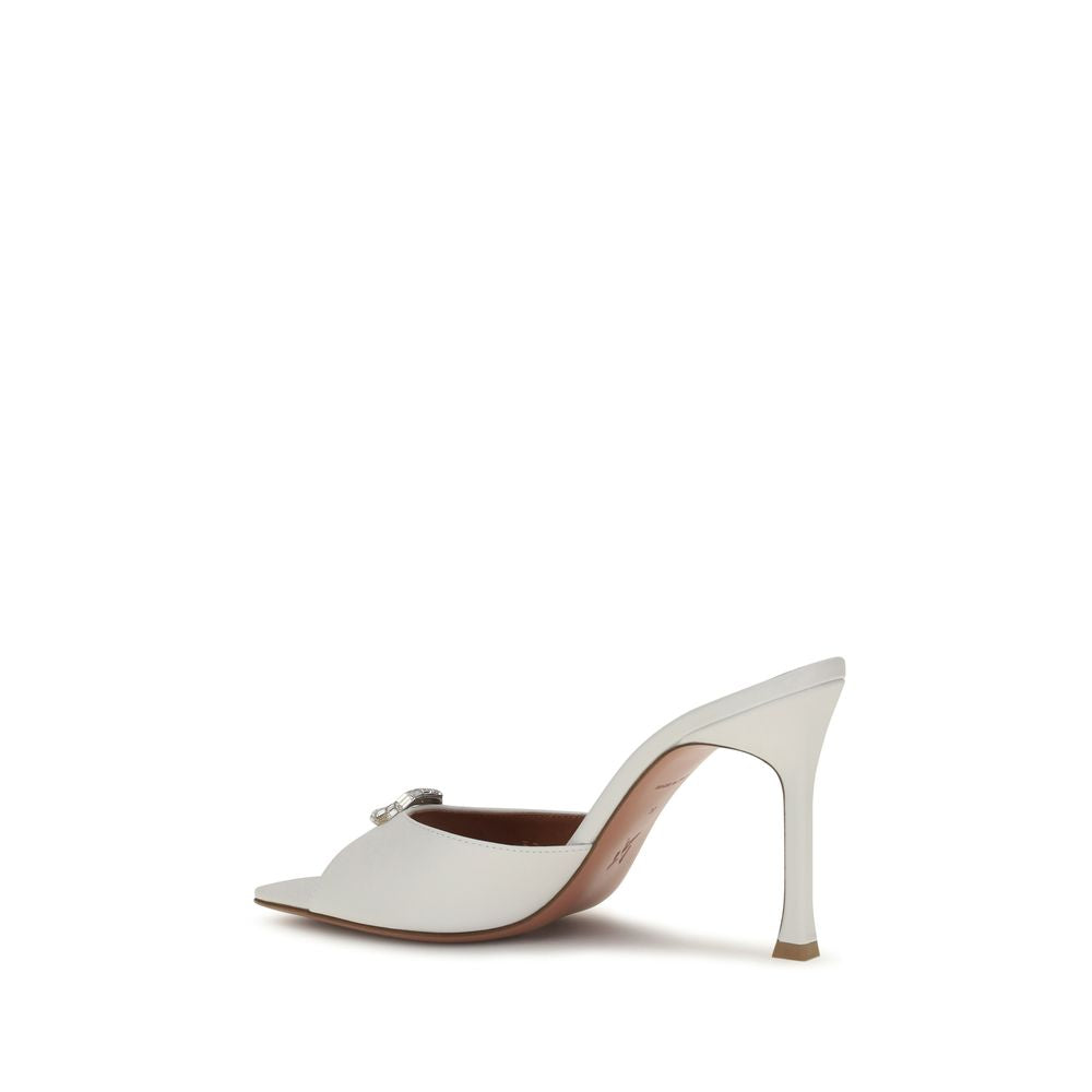 White high-heeled shoe on a white background