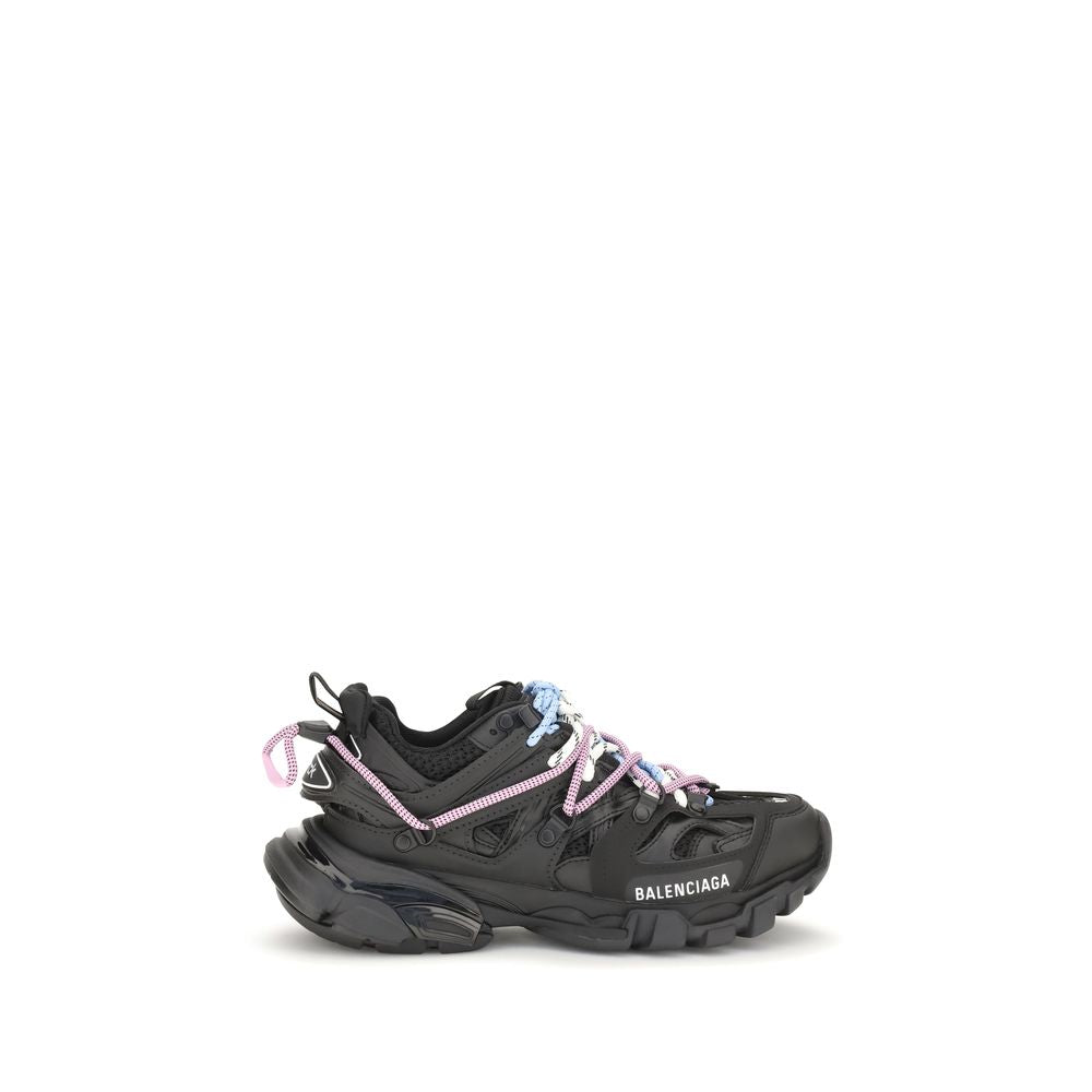 Brown sneaker with white laces on a white background