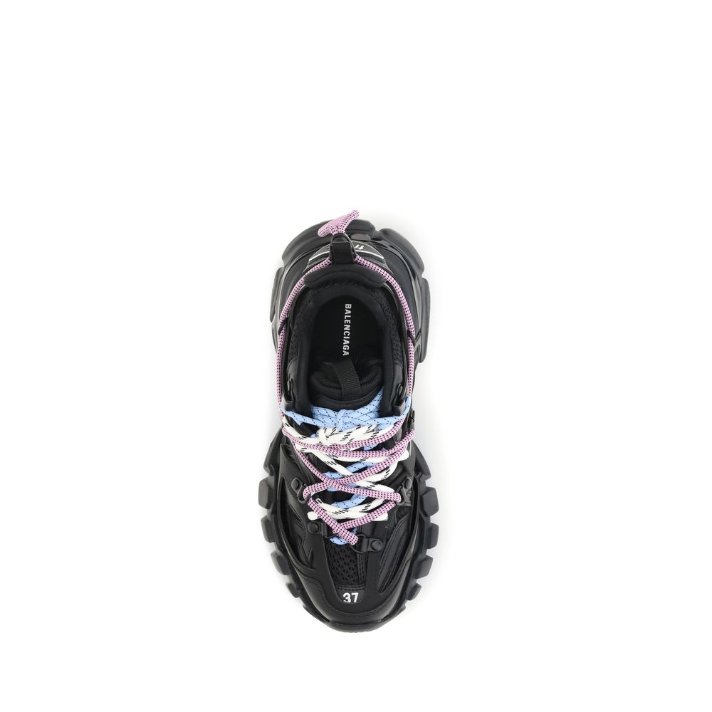 Black sneaker with colorful laces on a white background
