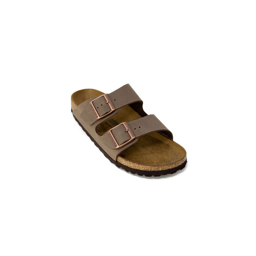 Brown sandal with two buckles on a white background