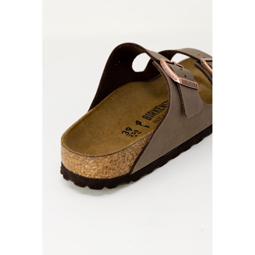 Brown sandal with cork sole on a white background
